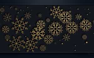 Un arrière-plan de bureau pour Noël avec un design de flocons de neige.